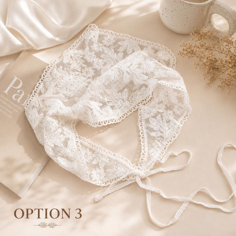 May include: A white lace collar with floral and leaf patterns. The collar has a tie closure and is displayed on a neutral surface. The text "OPTION 3" is visible at the bottom of the image.