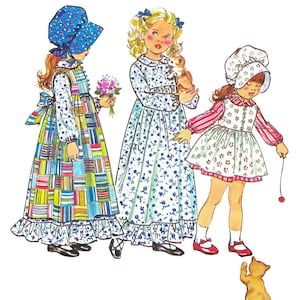 May include: Paper Ladies Patterns S-5996, Size 3, Chest 22 inches. An illustration of three children wearing dresses and bonnets. One wears a colorful patchwork dress, another a blue floral dress, and the third a white dress with red stripes.