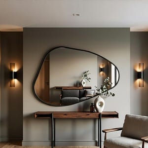 Asymmetrische wandspiegel met dunne lijst, vrije gevormde spiegel met organische vorm in antraciet, modern interieur