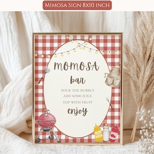 May include: A framed sign with a red and white checkered background. The sign reads "Mimosa Bar" with instructions and illustrations of a grill, condiments, and a pitcher. The sign is 8x10 inches.