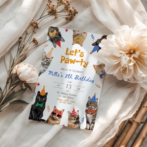 May include: A birthday party invitation with the text "Let's Paw-ty" and "Millie's 8th Birthday". The invitation features illustrations of cats wearing party hats, bow ties, and sunglasses. The date and address are also included.