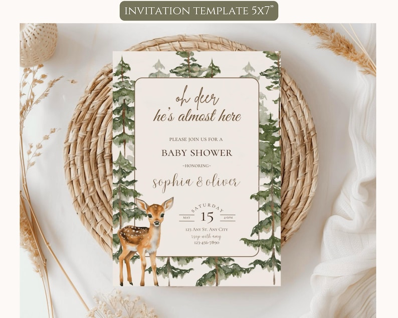 May include: A 5x7 inch baby shower invitation template featuring a watercolor illustration of a fawn and pine trees. The text reads: oh deer he's almost here, PLEASE JOIN US FOR A BABY SHOWER, HONORING, sophia & oliver, SATURDAY MAY 15, 123 ANY ST, ANY CITY.