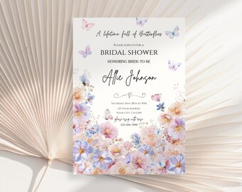 May include: A white bridal shower invitation with a watercolor floral border featuring pink and purple flowers and butterflies. The text reads "A lifetime full of Butterflies" and "Please join us for a Bridal Shower honoring Bride-to-be Allie Johnson". The invitation includes the date, time, address, and RSVP information.