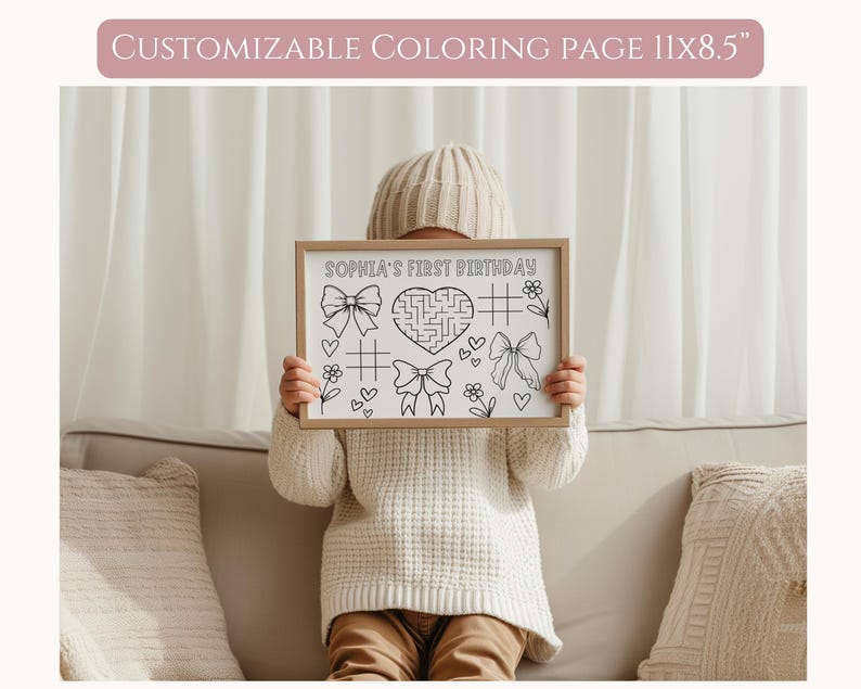 May include: A black and white printable coloring page with a maze, hearts, bows, and flowers. The page is titled "Sophia's First Birthday".