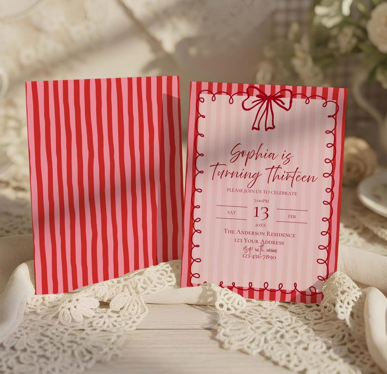 May include: Pink and red striped invitation card with the text "Sophia is Turning Thirteen." The invitation has a decorative border and a bow at the top. The back of the card has vertical red and pink stripes.