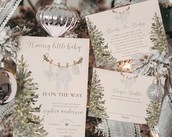 May include: A baby shower invitation with a winter theme. The invitation features a watercolor illustration of a pine tree with lights and a clothesline with baby clothes hanging on it. The text on the invitation reads "A merry little baby is on the way" and includes the name "sophia anderson".