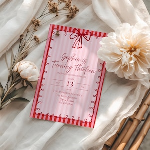 May include: A pink and red birthday invitation with the text "Sophia is Turning Thirteen." The invitation has a striped background and a decorative red border. The date is February 13th, with the time listed as 7:00 PM.