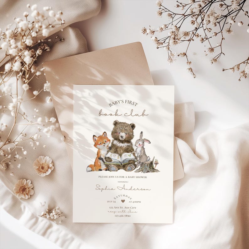 May include: A baby shower invitation with the text "Baby's First Book Club." The invitation features illustrations of a fox, bear, and rabbit reading a book. The invitation includes the name Sophia Anderson, date, time, and address.