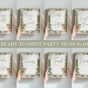 May include: A set of eight 8x10 inch party signs featuring a forest theme with green pine trees and a fawn illustration. The signs include text for Diaper Raffle, Babies are Sweet, Cards & Gifts, Guest Book, Books & Gifts, Favors, Food, and Drinks.