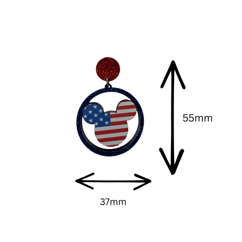 May include: A pair of patriotic earrings featuring a Mickey Mouse head design with the American flag. The earrings are approximately 2.2 inches long and 1.5 inches wide. The top is a red glitter circle, and the frame is dark blue.