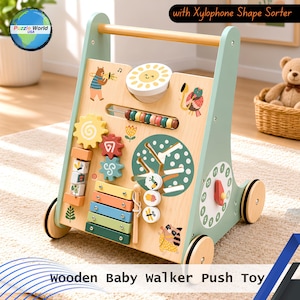 May include: Wooden baby walker push toy with a xylophone shape sorter. The wooden walker features a light green frame, a natural wood handle, and colorful interactive elements, including a xylophone, gears, and animal illustrations. The text "Puzzle World USA" is on the top left.