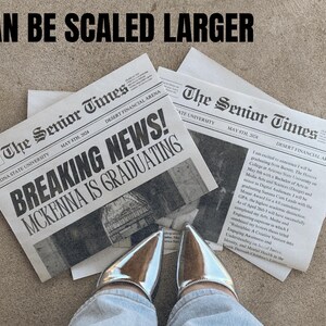 May include: A pair of silver high-heeled shoes with pointed toes. The shoes are worn by a person wearing blue jeans. The person is standing on a concrete surface with two newspapers on the ground. The newspapers are titled "The Senior Times" and feature the headline "BREAKING NEWS! MCKENNA IS GRADUATING".