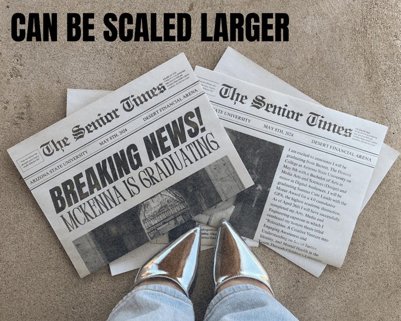 May include: A pair of silver high-heeled shoes with pointed toes. The shoes are worn by a person wearing blue jeans. The person is standing on a concrete surface with two newspapers on the ground. The newspapers are titled "The Senior Times" and feature the headline "BREAKING NEWS! MCKENNA IS GRADUATING".
