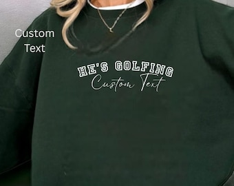 He's Golfing Sweatshirt, Golfing Season Sweater, Golfer Wife Crewneck, Golfing Mom, Golf Player for Mom, Golf Lover Pullover Personalized