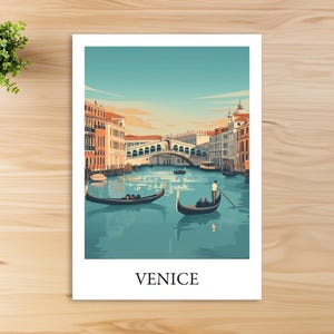 May include: A colorful illustration of a gondola on a canal in Venice, Italy. The Rialto Bridge is in the background. The text "VENICE" is printed below the image.