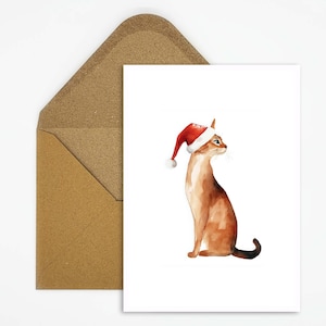 Kerstkaart met kattenmotief, Abessijnse kat met kerstmuts, ansichtkaart voor kattenliefhebbers voor dierenkerstmis als cadeau
