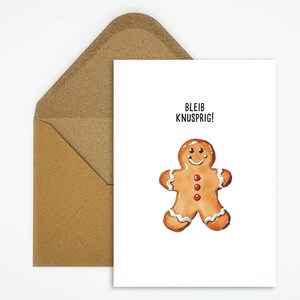 Lustige Weihnachtskarte Lebkuchenmann - Charmante Festtagsgrüße mit Wortspiel "Bleib knusprig!" für Freunde und Familie!