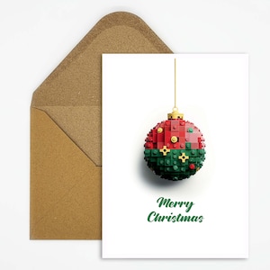 Kerstkaart, sneeuwbol van klemblokken, feestelijke ansichtkaart voor kerstgroeten met tekst Merry Christmas als cadeau