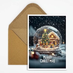 Ansichtkaart sneeuwbol Kerstlandschap van in elkaar klemmende bouwstenen, perfect voor een feestelijke groet of als kerstkaart om cadeau te geven