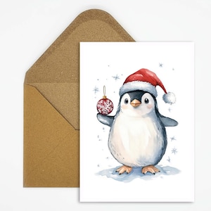 Kerstkaart, wenskaart - schattige pinguïn met kerstbal, handgeschilderde aquarelkaart voor speciale kerstgroeten