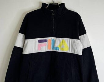 Suéter polar vintage FILA con logo colorido, negro y blanco, con cremallera de un cuarto, talla L
