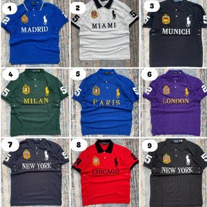 May include: Collection of polo shirts in various colors, each featuring city names like Madrid, Miami, Munich, Milan, Paris, London, New York, and Chicago. Each shirt has a number 5 or 3 on the sleeve and a logo.