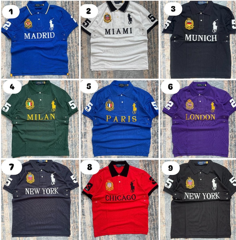 May include: Collection of polo shirts in various colors, each featuring city names like Madrid, Miami, Munich, Milan, Paris, London, New York, and Chicago. Each shirt has a number 5 or 3 on the sleeve and a logo.
