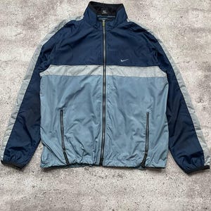 Vintage Nike Blue Windbreaker Jacket - Men&#39;s Size L - Retro Streetwear - Lightweight Nylon - Casual Outdoor Style - Full Zip Closure