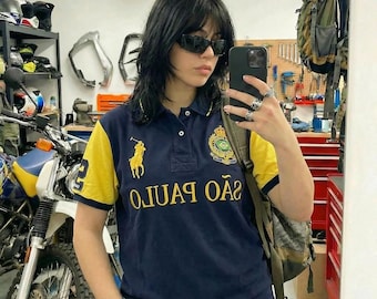 Koszulka polo Vintage Polo Ralph Lauren Sao Paulo w kolorze niebiesko-złotym z haftowanym herbem