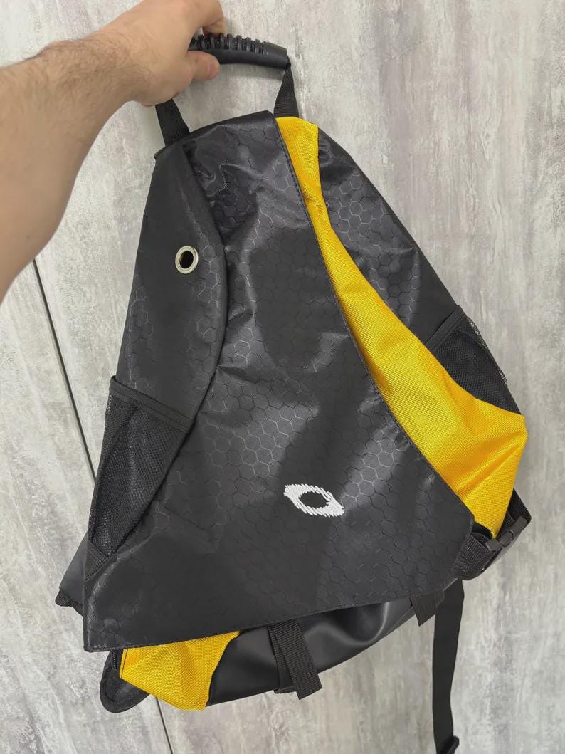 OAKLEY オークリー　ショルダーバッグ black×yellow y2k Vintage Oakley Style Hex Grid Sling Backpack Black Red Yellow