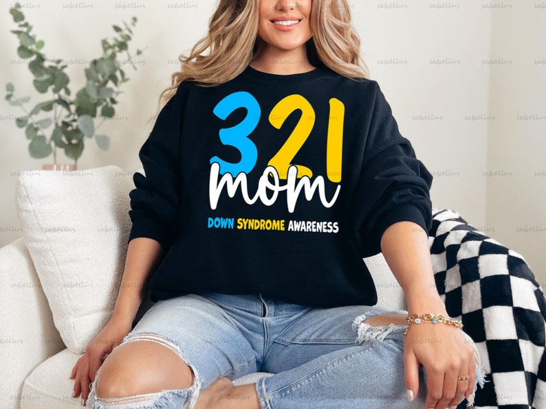 May include: Black sweatshirt with a yellow and blue graphic that says "321 mom" and "Down Syndrome Awareness".