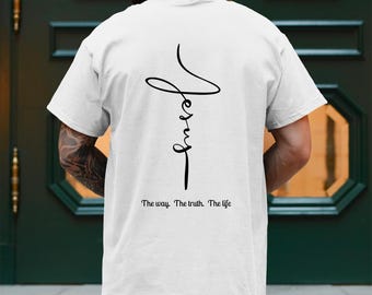 May include: White t-shirt with a black cross and the words "Jesus, The way. The truth. The life" printed on the back.