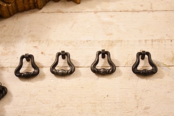 Ancient pendulum handles in Zamak