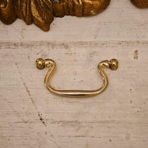 Antique 20th century Italian polished brass furniture handle