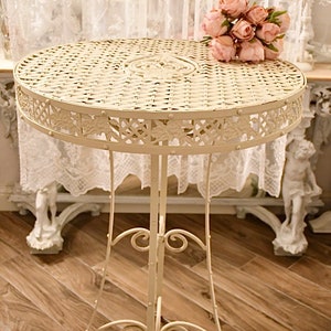 Delightful cream wrought iron table from the 1930s Italian era