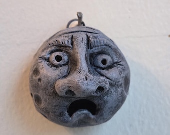 Tiny Man, Big Opinions -- Strange Wall Décor