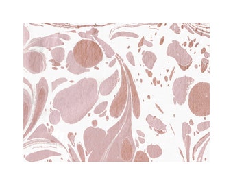 May include: A sheet of paper featuring a marbled pattern with organic, fluid shapes in shades of dusty rose and metallic copper set against a stark white background. The design displays swirling, interconnected blobs and elongated streaks.