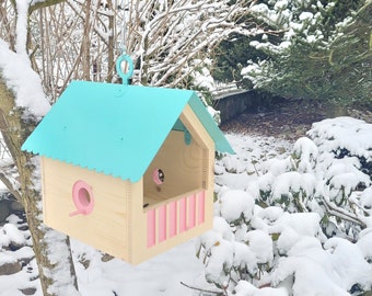 Very cute wooden feeder for small birds