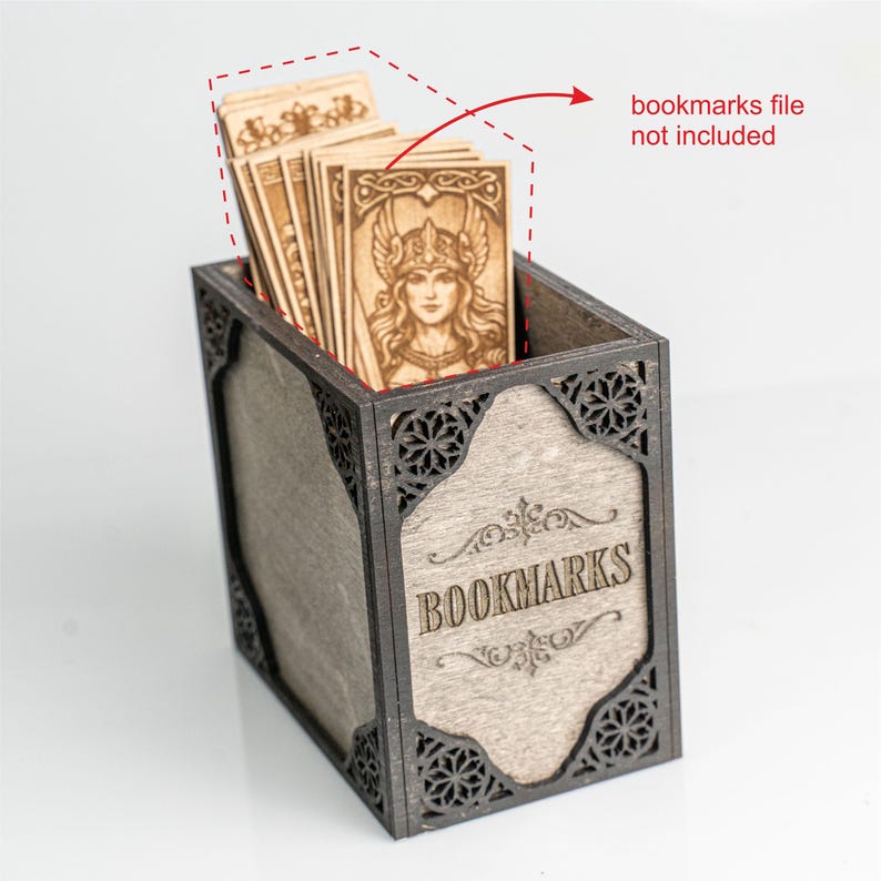 May include: Wooden bookmark holder with laser-cut detailing and the word "Bookmarks" engraved on the front. The holder contains several wooden bookmarks with an engraved image of a woman. The bookmarks file is not included.