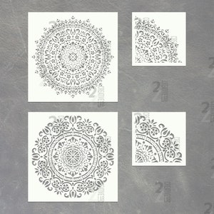 Może przedstawiać: Cztery białe arkusze szablonów z misternymi wzorami mandali. Szablony idealnie nadają się do tworzenia dekoracyjnych wzorów na ścianach, meblach i innych powierzchniach.