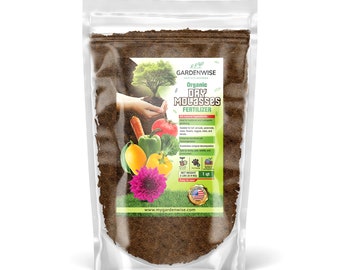May include: A bag of GardenWise Organic Dry Molasses Fertilizer. The bag is clear plastic and shows the brown fertilizer inside. The label is green and white with a picture of a hand planting a small tree. The label also says "Organic Dry Molasses Fertilizer" and "1 qt".