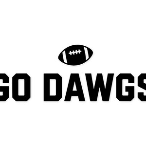 May include: A black and white graphic featuring the text "GO DAWGS" in bold, block letters. Above the text is a black American football. The background is plain white.