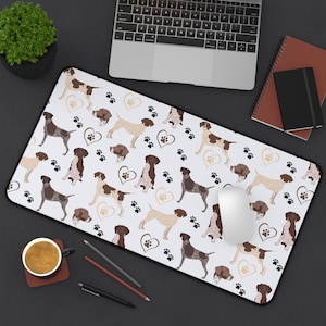 May include: A white mouse mat with a repeating pattern of brown and white German Shorthaired Pointer dogs, hearts, and paw prints.