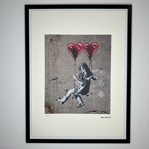 BANKSY: Framed lithograph. Limited edition with certificate, hand-numbered out of 150 copies.