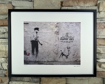 BANKSY: Framed lithograph. Limited edition with certificate, hand-numbered out of 150 copies.