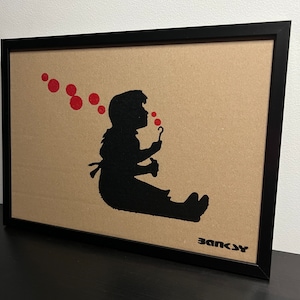 BANKSY (d’après) : Superbe Pochoir sur Carton -Encadré- Seulement 50 exemplaires.