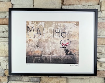 BANKSY: Framed lithograph. Limited edition with certificate, hand-numbered out of 150 copies.
