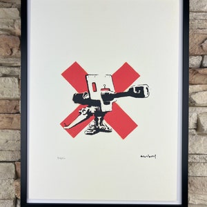 BANKSY: Framed lithograph. Limited edition with certificate, hand-numbered out of 150 copies.