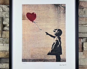 BANKSY: Framed lithograph. Limited edition with certificate, hand-numbered out of 150 copies.
