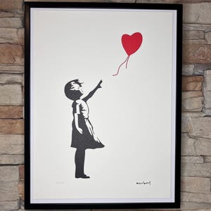 BANKSY: Framed lithograph. Limited edition with certificate, hand-numbered out of 150 copies.